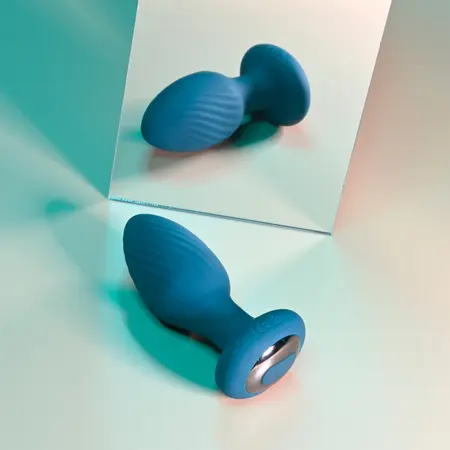 Spinning Tail въртящ се силиконов анален разширител с дистанционно, тюркоазен